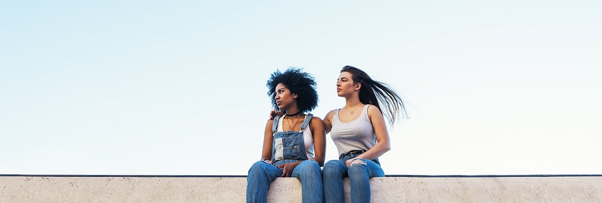 two women sitting together