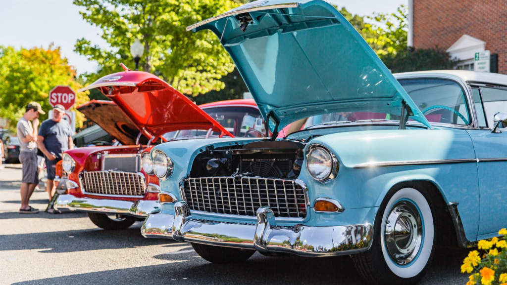 Vintage cars with hood up